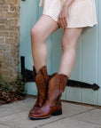 Rich brown cowboy boots from Ariat