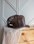 Brown western retro trucker cap with adjustable snapback and mesh back