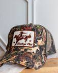 Western camo cowboy trucker cap with embroidered cowboy patch, front view