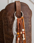 Desert Wanderer lace cowboy boot tassel, close-up detail