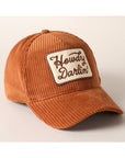 Side angle of brown corduroy cap with pre-curved visor and patch detail