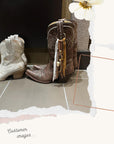 Customer wearing Desert Wanderer cowboy boot tassel accessory