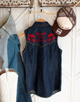 Dark indigo western denim shirt with red flame embroidery and copper collar tips