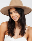 Women's brown cowgirl hat