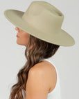 light cowgirl hat, wide brimmed