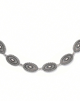 Western silver concho hat chain styled on a trucker cap