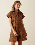 Front view of the Ariat Cody Dress, a brown western mini dress with collar, button front and short sleeves, worn with turquoise earrings