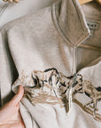 Close-up of the cosy mid-weight fleece fabric on the Ariat Running Wild sweatshirt