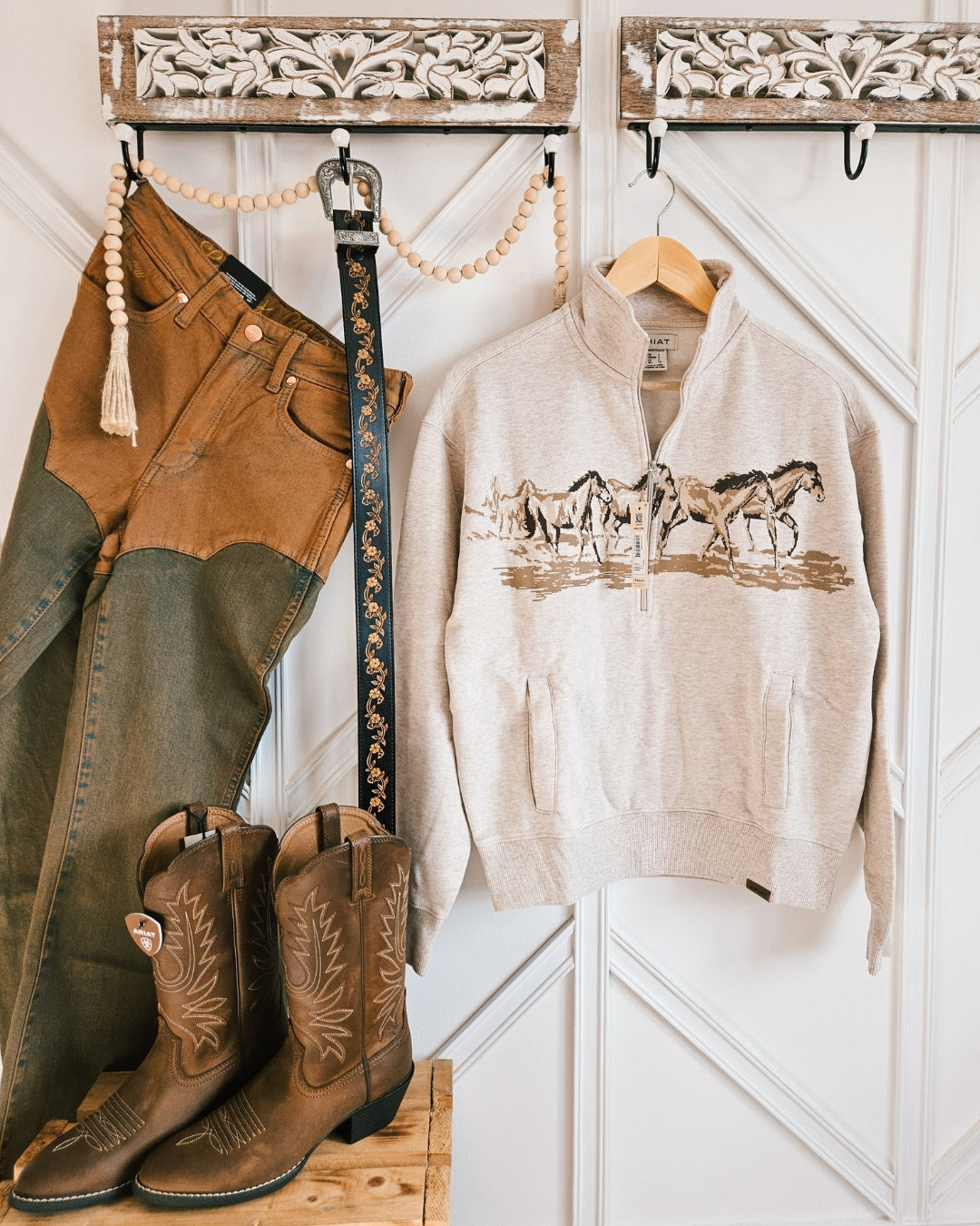 Ariat Running Wild half-zip sweatshirt styled in a Western outfit