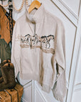 Side view of the Ariat Running Wild half-zip sweatshirt showing the relaxed fit
