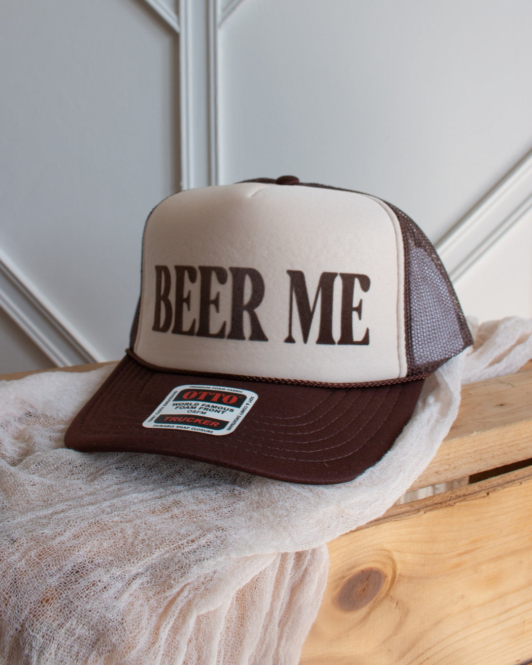 Beer Me retro brown unisex trucker cap with bold slogan, front view