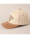 cream and tan western slogan cap