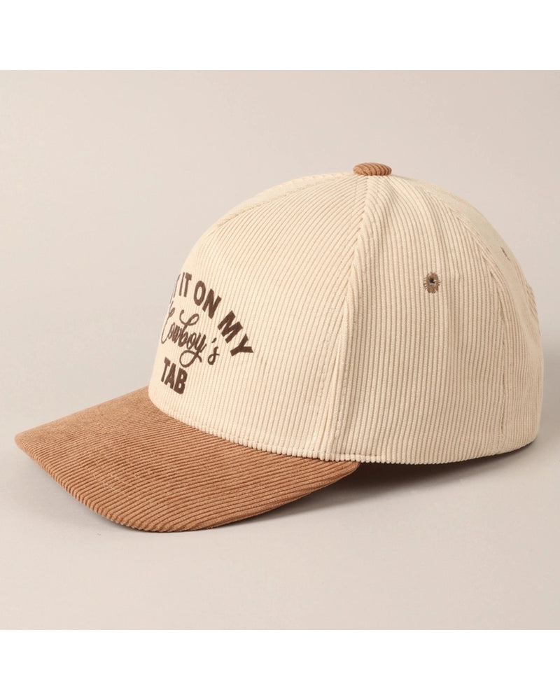 cream and tan western slogan cap