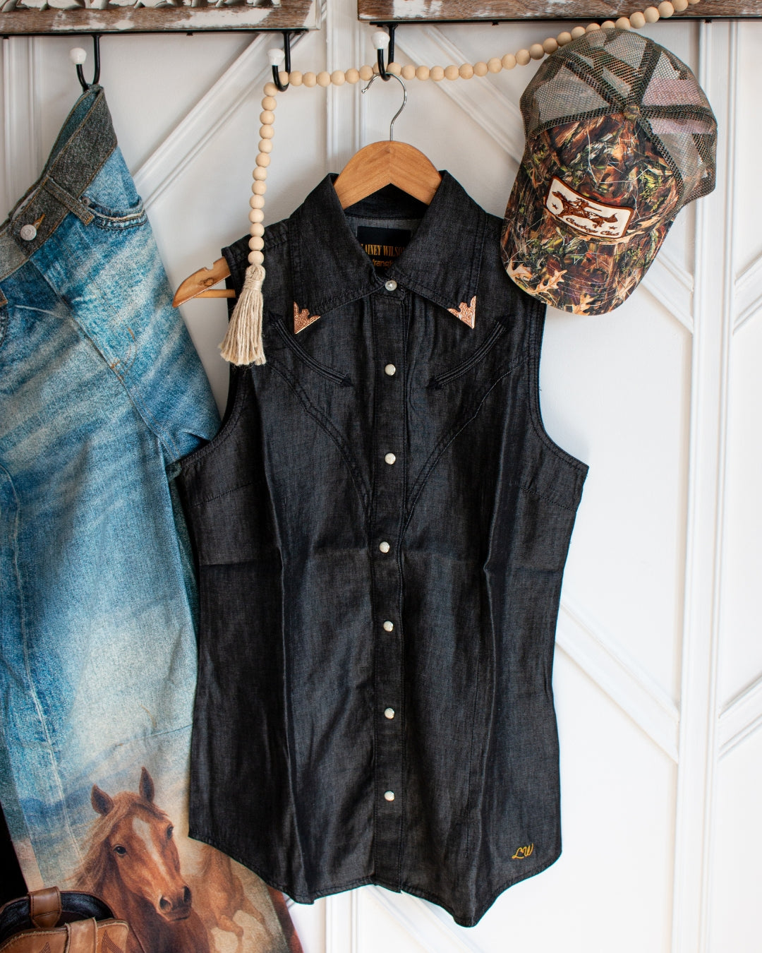 Black denim western sleeveless shirt with pearl snaps and copper collar tips