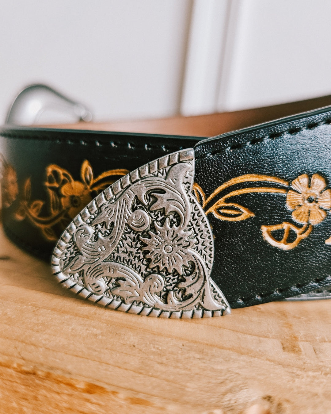Black floral tooled leather Western belt, 1.5 inch width with genuine leather lining