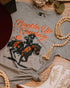 Buckle Up Cowboy graphic t-shirt, front view