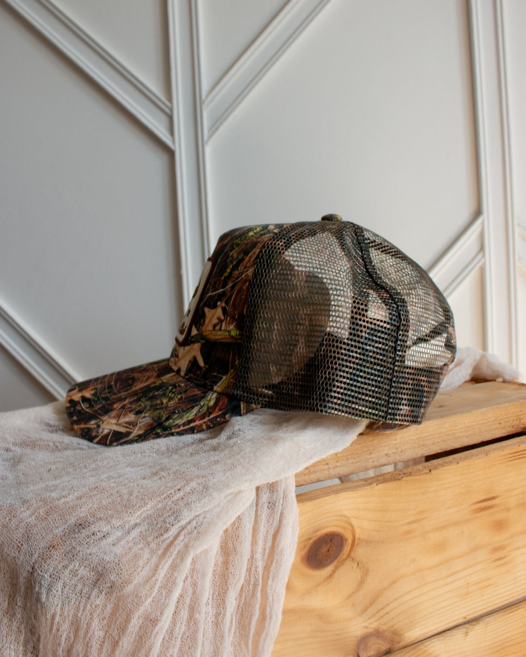 Camo western snapback cap with 5-panel design and embroidered cowboy logo