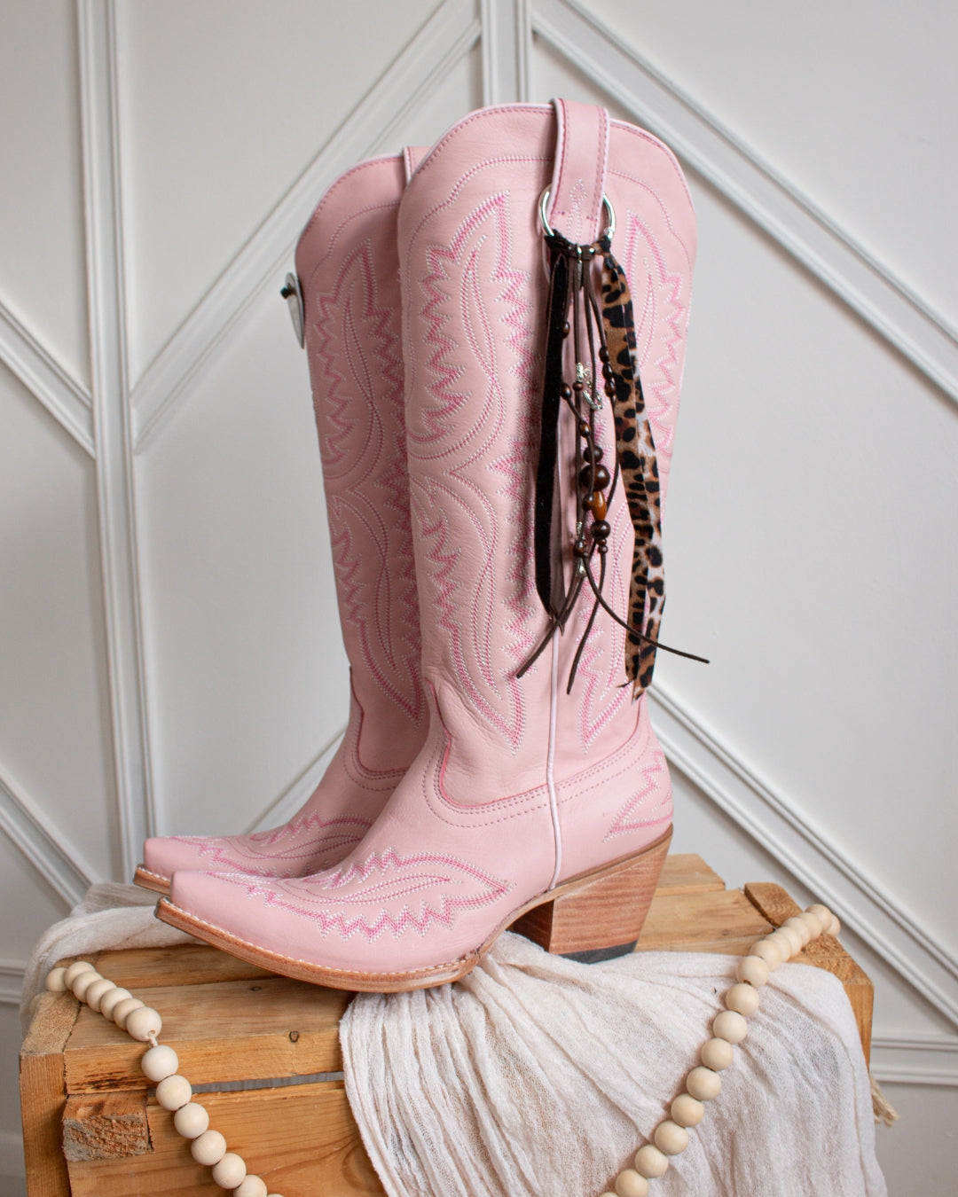 Wild Spirit leopard and velvet cowboy boot tassel accessory, main view
