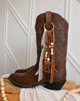 Desert Wanderer cowboy boot tassel styled on Ariat boots