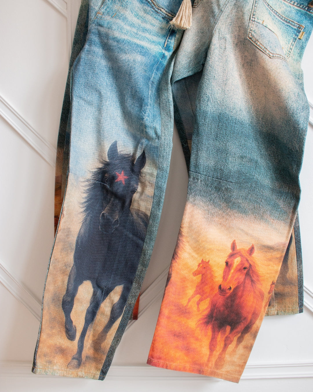 High-rise horse print barrel jeans with 30-inch inseam and button fly