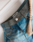 Horse print barrel jeans front detail showing 5-pocket design and zip fly