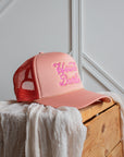Howdy Darlin' pink trucker cap, three-quarter view