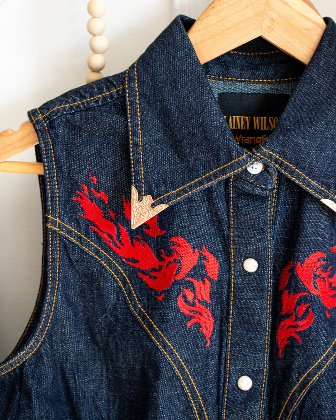Lainey Wilson embroidered western shirt showing back detail and pearl snaps