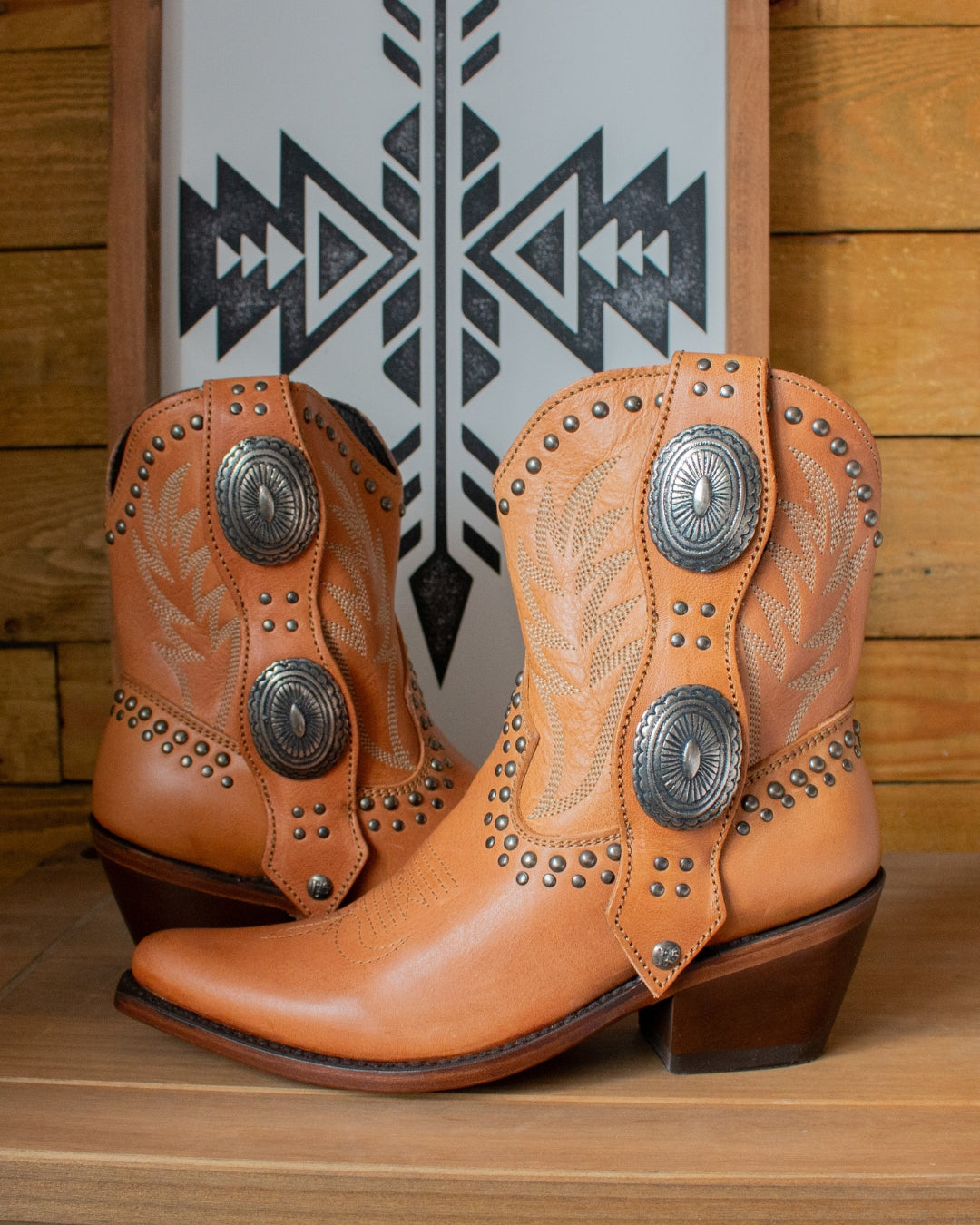 Liberty Black Shirley amber leather ankle cowboy boots, pair view showing concho detail