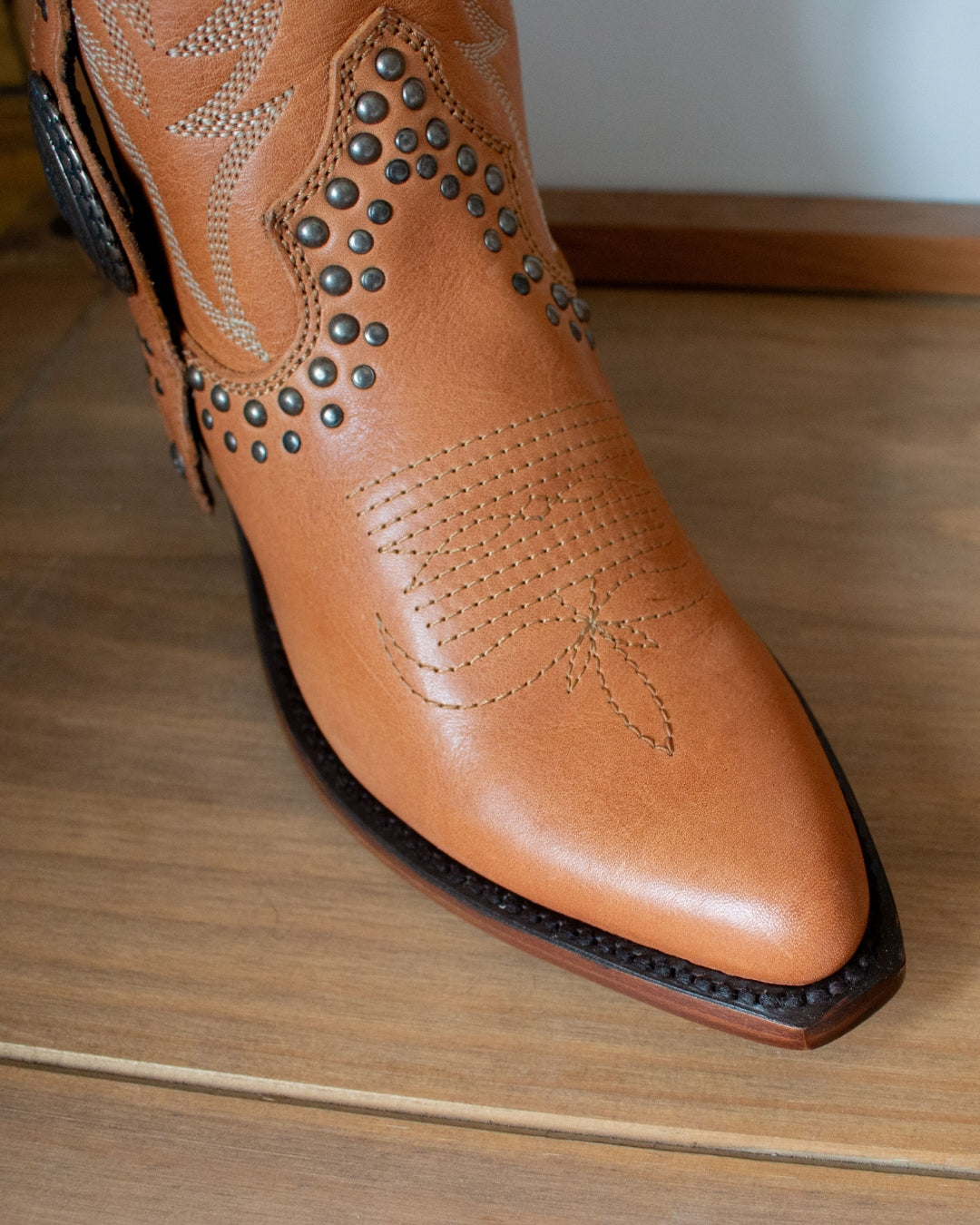 Liberty Black Shirley ankle boots showing pointed toe and stud detailing