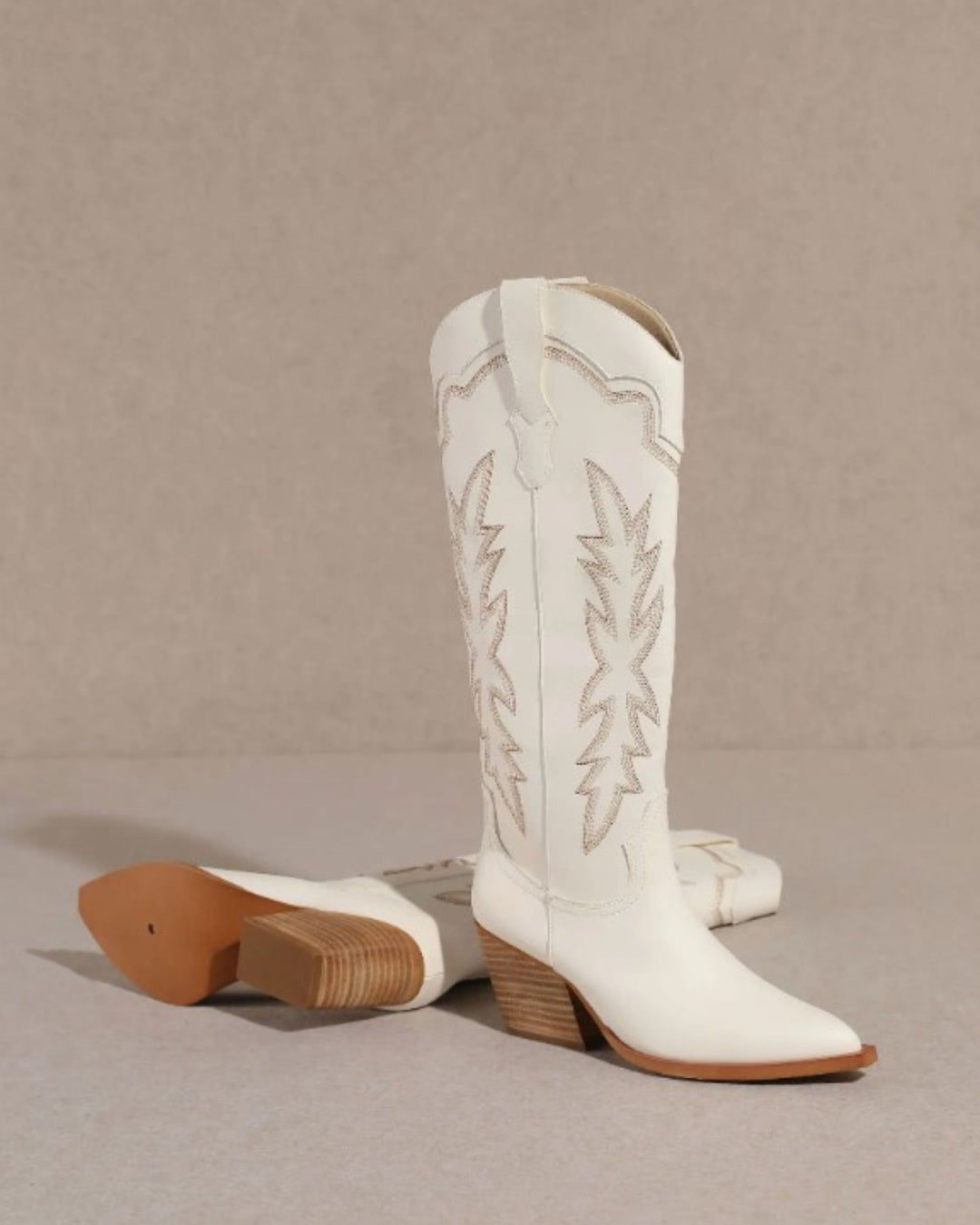 White heeled cowboy boots
