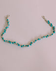 Turquoise stone cap chain with authentic bead design, close-up