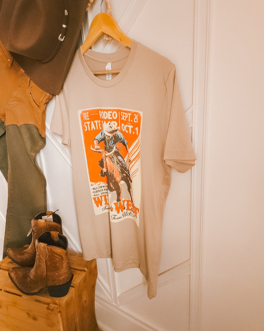 Side view of the Vintage Wild West rodeo cowboy graphic tee