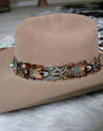 Feather and turquoise cowboy hat band