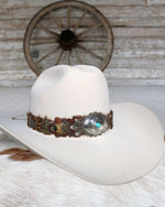 Feather and turquoise cowboy hat accessory 