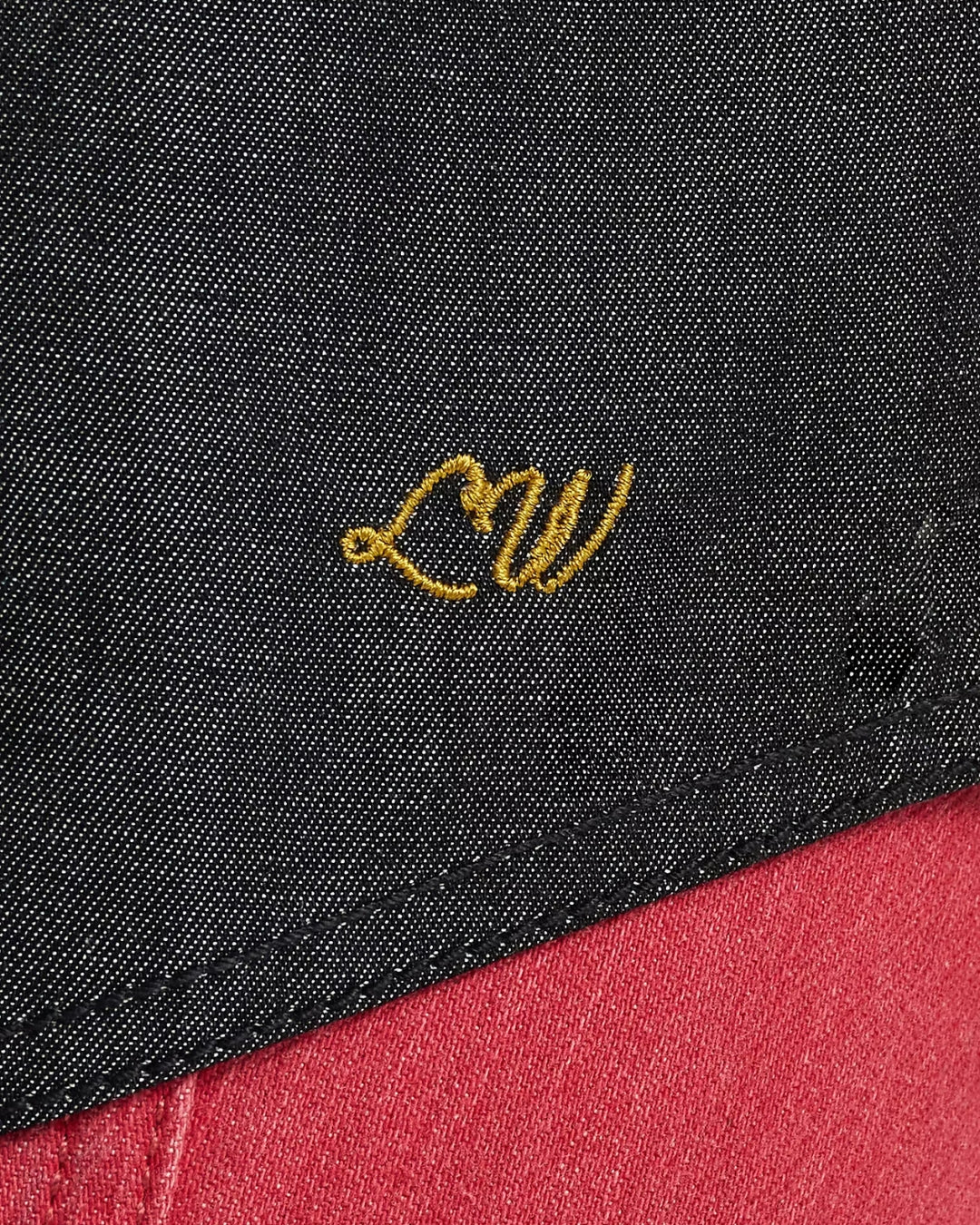 Lainey Wilson embroidered signature detail on Wrangler black denim western shirt