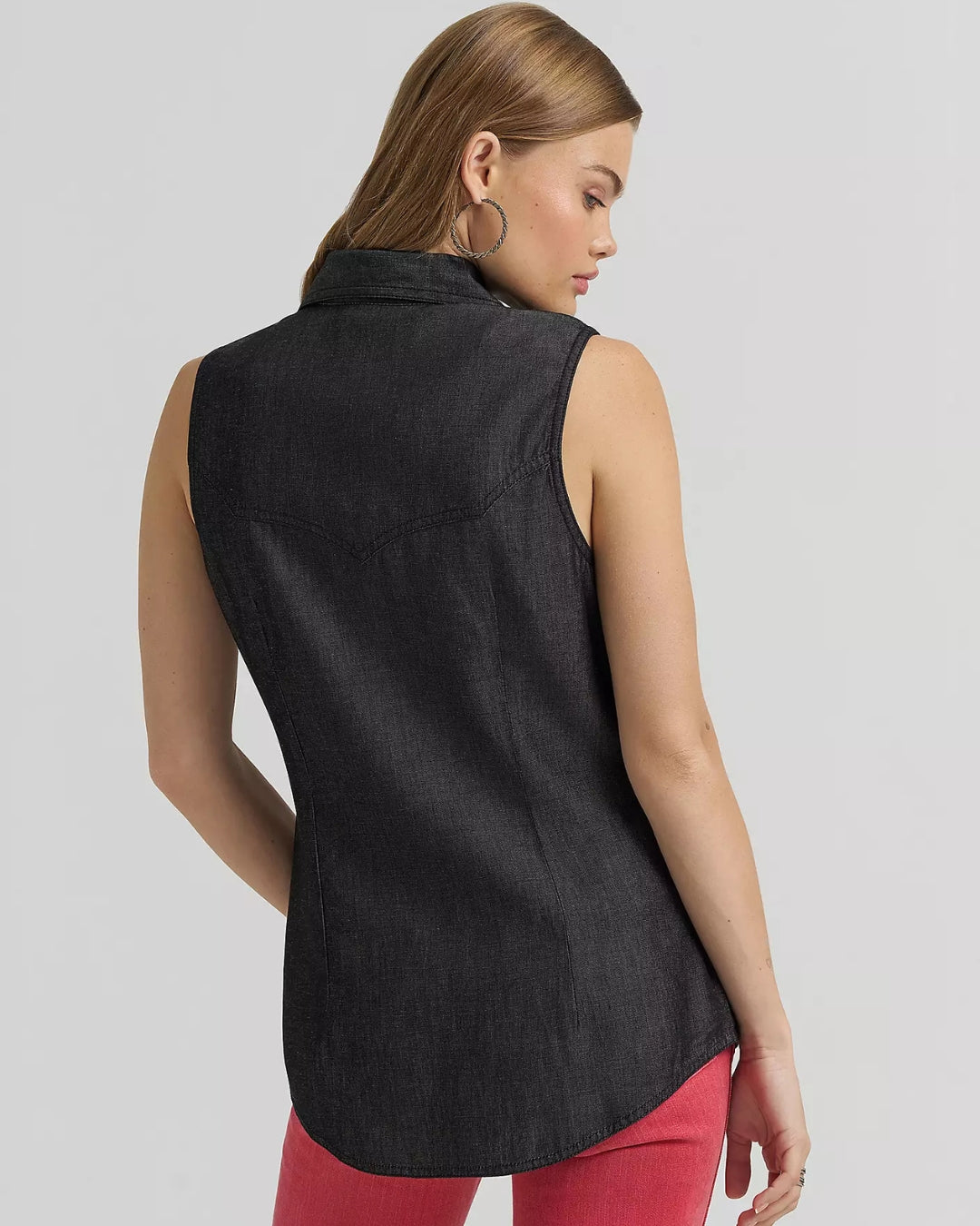 Rear view of Wrangler x Lainey Wilson black denim sleeveless western shirt